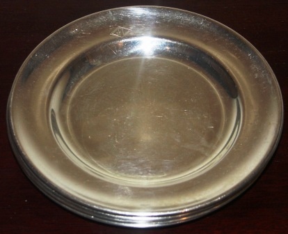 Silver-plated/stainless arrangement plates from the shipping company GFL (Göteborg-Fredrikshavns Linjen). Made by Gense, Sweden.