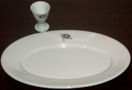 Mid 20th century German shipping company porcelain with logo and initials HH AC. Made by Felda Rhön/Fabrikdekor Weitz. Platter and egg cup. 
