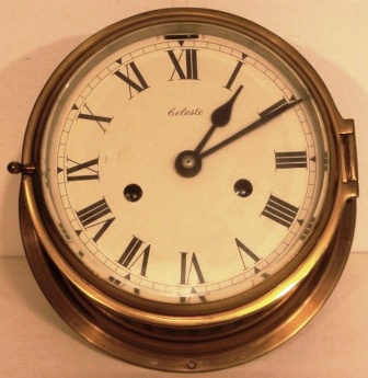 Mid 20th century Celeste ships clock made of brass. Incl 8 bell movement and original key.