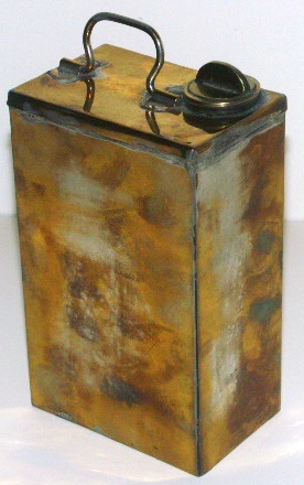Early 20th century brass oil container with carrying handle.