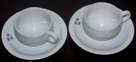 A pair of coffee cups and plates from the SWEDISH AMERICAN LINE. Made by Bauscher Weiden, Germany. 