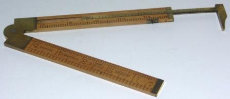 Early 20th century caliper/folding rule made of wood and brass. Manufactured in the US by Lufkin. No 372 (36 1/2). "Warranted Boxwood". 