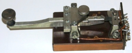 20th century telegraph / morse key, made of metal and mounted on bakelite base. 