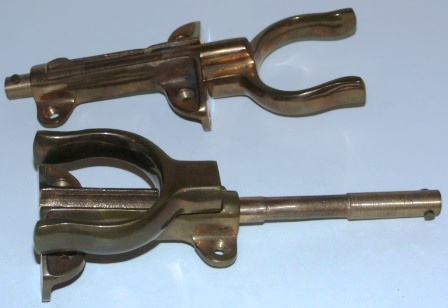 A pair of 20th century folding rowlocks made of bronze.