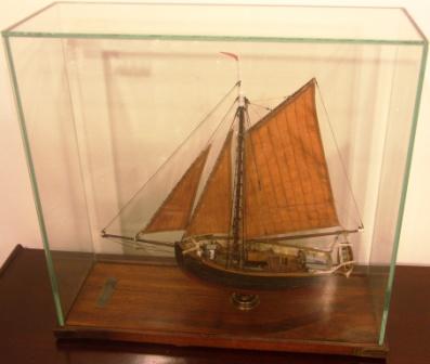 Texerina, built in Höganäs 1847, dismantled in Borgholm 1934. Model mounted in glass case; Length 39cm, width 14cm, height 35cm (glass case)