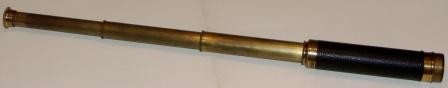 Early 20th century hand-held refracting 25x telescope, maker unknown. With three brass draws and leather bound tube. 