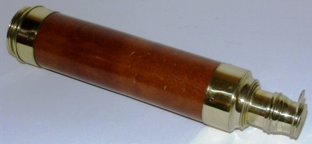 Mid 19th century hand-held refracting telescope, maker unknown. With three brass draws and mahogany bound tube.
