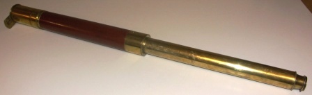 19th century hand-held refracting telescope, made by J.J. Messer, London. "Day or Night." One draw, brass and mahogany bound tube. 