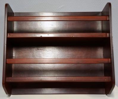 A pair of wall-mounted mahogany (book-)shelves from M/S Arolla, Nautilus shipping company. Two shelves with detachable rails.