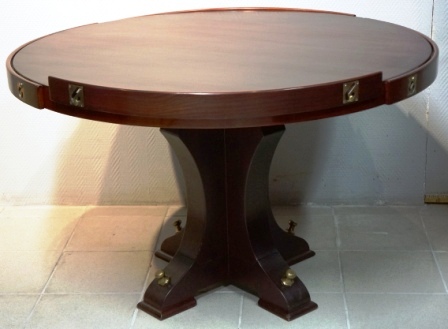 Round table in mahogany with adjustable rails. From M/S Arolla, Nautilus shipping company.