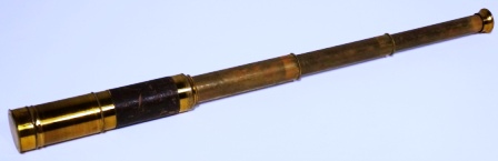 Late 19th century hand-held refracting telescope, maker unknown. Three brass draws, reflex protection, leather bound tube.