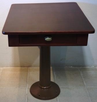 A pair of tables from the Swedish American Liner S/S Kastelholm. One drawer. Mahogany, galvanized brown-painted metal base. 