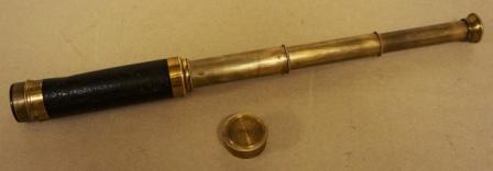 Late 19th century hand-held refracting telescope, maker unknown. With three brass draws and leather bound tube. 