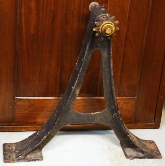 Early 20th century metal wheel stand