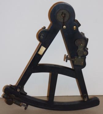 Early 19th century octant. Maker unknown. Ebony frame and peep-hole eyepiece, scales and note plaque in ivory. 