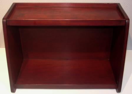 A pair of wall-mounted shelves in mahogany from M/S Arolla, Nautilus shipping company.