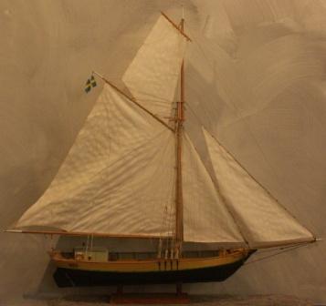 20th century wooden cargo boat Josefina with fine details and loaded with firewood. 