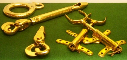 20th century rigging or bottle screws, shackles and rowlocks made in solid brass.