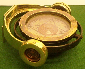 20th century compass mounted in gimbals and furnished with wall-bracket. Made by AB Lyth, Stockholm.