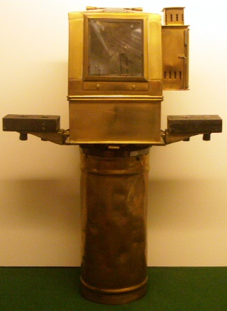 20th century brass binnacle mounted on brass stand with wall mounting support. Brass dome with kerosene lamp. Maker unknown, dated 1952 and furnished with compass made by AB Lyth, Stockholm. 