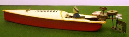 20th century sheet-metal powerboat toy model, fitted with outboard motor. 