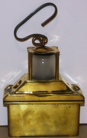 Mid 20th century battery driven emergency light. Brass, detachable handle. 