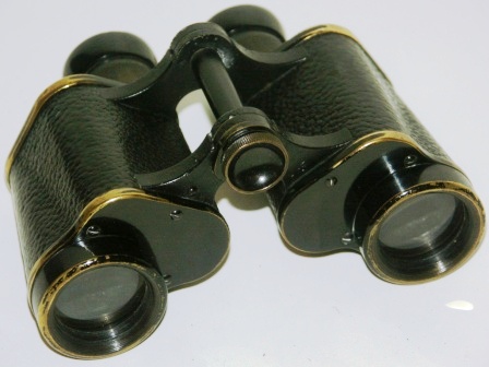 Early 20th century Carl Zeiss/Jena "Marineglas" binocular. Made of black laquered brass, leather-bound. 