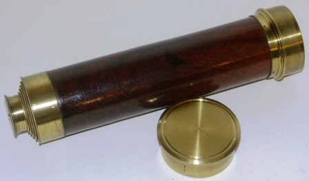 19th century hand-held refracting telescope, made by Vincent Somalvico, London. With five brass draws and walnut and brass bound tube. 