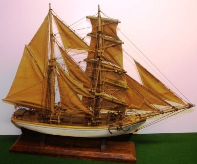 20th century built model with set sails depicting a 19th century brigantine.