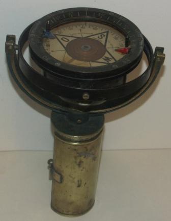 20th century brass compass mounted in original brass wall bracket. Made by Lyth Stockholm, TK 07 No 15358. 