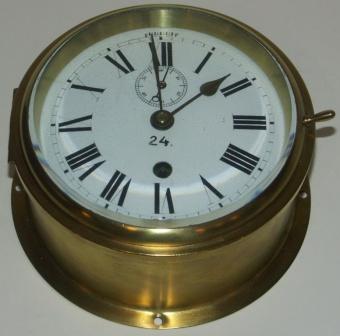 Early 20th century ships clock from an English Naval vessel. Made of brass. 