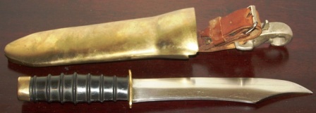 20th century diving knife made in the USSR. Brass sheath and rubber-dressed handle. Leather and aluminum buckle.