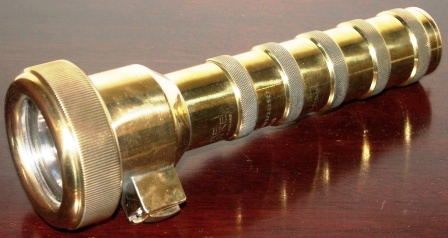 20th century underwater flashlight made of brass. Made by Siebe Heinke of England 1969, marked both with NSN-6230-99-520-1611 and Ap. No. 0563/202927.