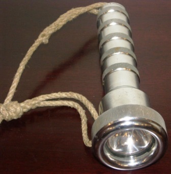 20th century chrome-plated underwater flashlight. Made by Siebe Gorman 1968, marked NSN-6230-99-520-1611. 