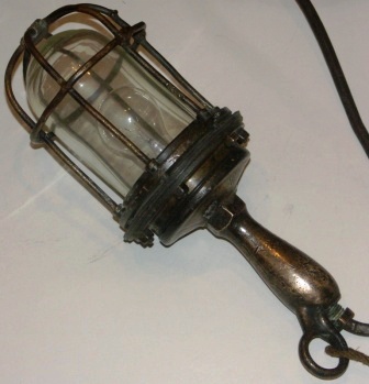 20th century hand-held electrified diving lamp. Made of brass.