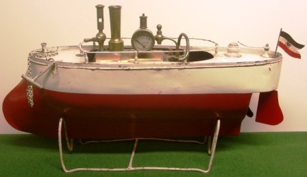 Sheet-metal built steamboat from the German Emperor period (early 20th century), complete with steam engine, binnacle and rotating anchor winch