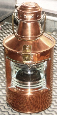 20th century copper stern light. Manufacturer unknown. Marked with Tø-1814 10/51. 