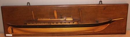Late 19th century built half-block model depicting a passenger and mail steamer. Mounted on mahogany panel.