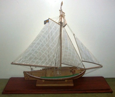 Mid 20th century built model depicting "Ålands seglande fisksump JEHU". A typical gaff rigged fishing boat from Åland/Baltic Sea. Mounted in a glass case. 