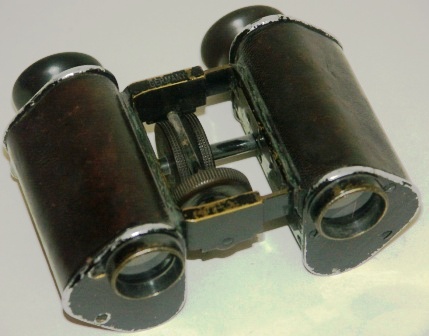 Late 19th century binocular made by C.P. Goerz, Berlin. "Trieder Binocle", 9x. Made of black laquered metal, leather-bound.