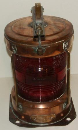 Electrified 20th century all round red signal light in copper and brass, marked BT 400 NK 77. 