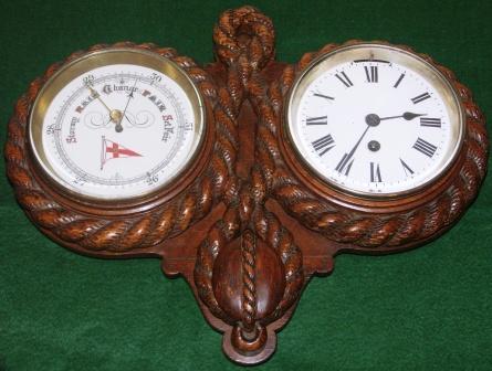 Early 20th centuryships clock and barometer with Royal Yacht Club emblem. Cased in decoratively carved wooden panel. 