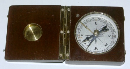 Early 20th century pocket compass in wooden box.