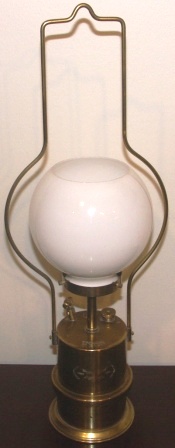 Early 20th century carbide lamp made of brass, with glass-shade. Marked with Three Crowns, Typ 4 and No 65. Made by MF-AB Eskilstuna, Sweden.