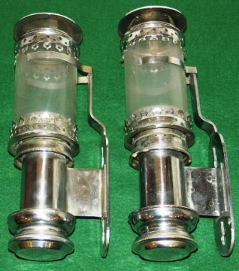 A pair of early 1920's chrome-plated sconces for candles.