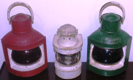 Set of early 20th century kerosene port, starboard and masthead lights. Made of sheet metal. With detachable burner/container.