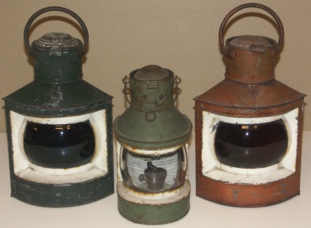 Set of early 20th century port, starboard and masthead navigation lights. Made of painted sheet metal. Complete with kerosene burners.