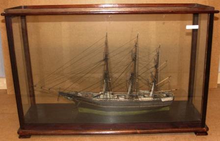 19th century sailor-made fullrigged model. Mounted in glass case.