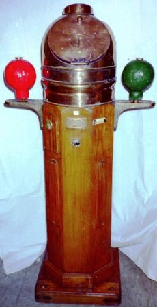 Early 20th century ship's binnacle with floating compass card, mounted in gimbals. Brass dome mounted on teak stand. Made by Plath & Co, Hamburg.
