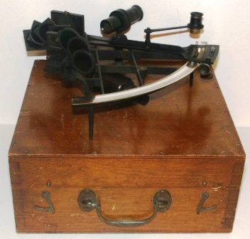 Late 19th century brass sextant made by Crichton & Son, London. Sold by E. Esdaile & Sons, Sydney.Latticframe, silver scale, vernier with a magnifier to assist scale readings, one telescope and seven sun-filters. In original wooden case.